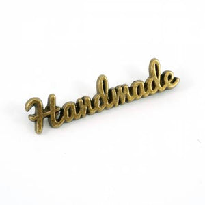 Metal Bag Label - "Handmade" - Script, Hardware, Emmaline Bags, Antique Brass - Mad About Patchwork
