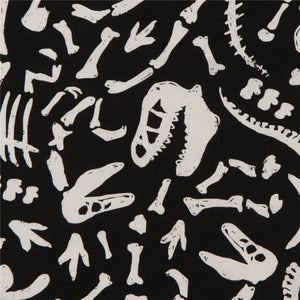Timeless Treasures Glow in the Dark - Dino Bones