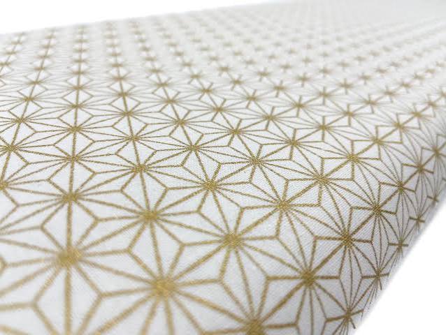 6 point star, gold metallic on White from Sevenberry Fabrics